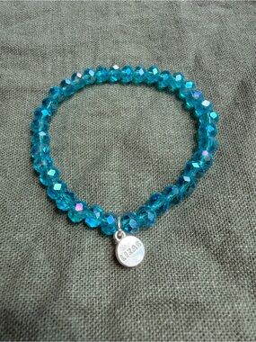 Sparkling Teal Bead Stretch Bracelet with Round Logo Charm